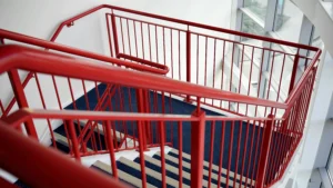 Powder-coated steel stair railing in modern commercial building